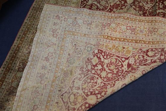 A Qum silk rug, 5ft 3in by 4ft.